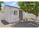 Charming backyard shed with a classic design, adding character and extra storage space at 6263 E Duncan St, Mesa, AZ 85205