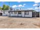 The backyard features a covered patio with a new paint job and a spacious area for outdoor activities and relaxation at 7137 N 22Nd Dr, Phoenix, AZ 85021