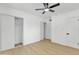 Cozy bedroom with neutral walls, closet, and modern ceiling fan at 7137 N 22Nd Dr, Phoenix, AZ 85021
