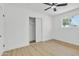 Bedroom with a closet and a ceiling fan offering a comfortable and functional space at 7137 N 22Nd Dr, Phoenix, AZ 85021