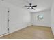 Bedroom featuring painted brick wall, ceiling fan, and window at 7137 N 22Nd Dr, Phoenix, AZ 85021