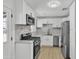 Recently remodeled kitchen boasting stainless steel appliances, modern finishes, and lots of natural light at 7137 N 22Nd Dr, Phoenix, AZ 85021