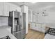 Recently remodeled kitchen boasting stainless steel appliances, modern finishes, and seamless flow into living area at 7137 N 22Nd Dr, Phoenix, AZ 85021