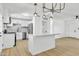 Modern updated kitchen showcasing stainless appliances, stylish pendant lights and a convenient kitchen island at 7137 N 22Nd Dr, Phoenix, AZ 85021