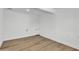 A versatile room features light wood flooring, white walls, neutral tones, and hookups for laundry appliances at 7137 N 22Nd Dr, Phoenix, AZ 85021