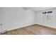 A versatile room features light wood flooring, white walls, a window and neutral tones for a calming atmosphere at 7137 N 22Nd Dr, Phoenix, AZ 85021