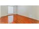 Neutral bedroom featuring light-filled window and gorgeous hardwood flooring at 1048 N Arroya --, Mesa, AZ 85205