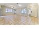 Spacious living room with vaulted ceiling, tile flooring, and plenty of natural light at 1048 N Arroya --, Mesa, AZ 85205