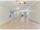 Bright, open living space with tile floors, neutral walls, and easy access to the kitchen at 1048 N Arroya --, Mesa, AZ 85205