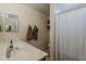 Bathroom with a shower and tub, vanity, and towel rack at 11101 E Abilene Ave, Mesa, AZ 85208