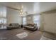 Inviting living room featuring neutral walls, plush sofas, and natural light at 11101 E Abilene Ave, Mesa, AZ 85208