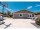 Spacious backyard with a basketball hoop, patio furniture, and rose bushes at 11450 E Elton Ave, Mesa, AZ 85208