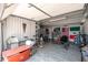 This garage features a variety of exercise equipment, bikes, and decor, offering space for fitness and personalization at 11450 E Elton Ave, Mesa, AZ 85208