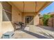 Inviting covered patio with stylish seating, perfect for outdoor relaxation and entertaining at 12910 W Glenrosa Dr, Litchfield Park, AZ 85340