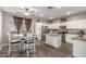 Well-equipped kitchen with stainless steel appliances, granite countertops, and ample cabinet space at 12910 W Glenrosa Dr, Litchfield Park, AZ 85340