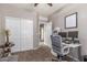 Office space with double monitors, office chair and built in storage at 12910 W Glenrosa Dr, Litchfield Park, AZ 85340