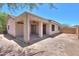 View of the backyard with a covered patio and a privacy fence at 1336 E Laurel Pl, Casa Grande, AZ 85122