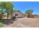 The backyard features low-maintenance landscaping and a view of the rear exterior at 1336 E Laurel Pl, Casa Grande, AZ 85122