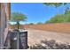 Large dirt backyard surrounded by block wall, great for customization and landscaping ideas at 1336 E Laurel Pl, Casa Grande, AZ 85122