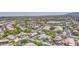 Expansive aerial view of a well-planned community with lush landscaping and mountain views at 1409 E Goldenrod St, Phoenix, AZ 85048