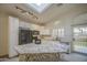 Bright kitchen features skylight, granite island, and modern appliances at 1409 E Goldenrod St, Phoenix, AZ 85048