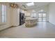 Kitchen has white cabinets, granite counters, stainless appliances, island with seating, and tile floors at 1409 E Goldenrod St, Phoenix, AZ 85048