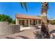 Backyard with patio and desert landscaping at 15011 W Verde Ln, Goodyear, AZ 85395
