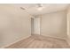 Neutral bedroom with light carpet and a standard ceiling fan at 15011 W Verde Ln, Goodyear, AZ 85395