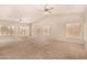 Bright and open living room with vaulted ceilings and lots of windows at 15011 W Verde Ln, Goodyear, AZ 85395