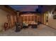 Inviting outdoor patio with fire pit, comfortable seating, and stylish lighting at 16178 W Granada Rd, Goodyear, AZ 85395