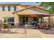 Outdoor patio with a dining area and comfortable seating, perfect for enjoying outdoor meals and gatherings at 16178 W Granada Rd, Goodyear, AZ 85395