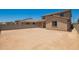 The backyard features a blank canvas and is surrounded by privacy walls for custom landscaping at 18365 W Villa Hermosa Ln, Surprise, AZ 85387