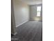 Bright bedroom with ample natural light, a neutral color palette, and plush carpeting at 18365 W Villa Hermosa Ln, Surprise, AZ 85387