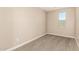 Neutral bedroom with carpet, a small window, and plenty of wall space at 18365 W Villa Hermosa Ln, Surprise, AZ 85387