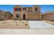 Inviting two-story home with red shutters and a low-maintenance desert landscape at 18365 W Villa Hermosa Ln, Surprise, AZ 85387