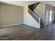 Open living room area featuring wood-style flooring and natural light at 18365 W Villa Hermosa Ln, Surprise, AZ 85387