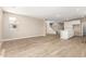 Spacious living area with tile floors, neutral paint, and an open floor plan at 18365 W Villa Hermosa Ln, Surprise, AZ 85387