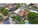 Aerial view of backyard featuring a pool, trampoline, putting green, hot tub, and pergola at 190 E Tremaine Ave, Gilbert, AZ 85234