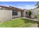 Charming home with a tiled roof, manicured lawn, and neutral stucco exterior at 190 E Tremaine Ave, Gilbert, AZ 85234