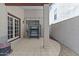 Covered patio with tiled flooring, providing a versatile outdoor living space at 190 E Tremaine Ave, Gilbert, AZ 85234