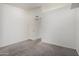 This bedroom boasts neutral paint and carpet, offering a blank canvas for personalization at 2059 E Brown Rd # 35, Mesa, AZ 85213
