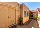 Charming exterior showcasing a private entry with a decorative front door and inviting curb appeal at 2059 E Brown Rd # 35, Mesa, AZ 85213