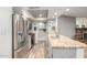 Bright kitchen features stainless steel appliances and neutral paint palette at 2059 E Brown Rd # 35, Mesa, AZ 85213