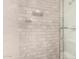 The shower features sleek tile, a modern shower head, and glass door at 2059 E Brown Rd # 35, Mesa, AZ 85213
