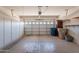 Spacious garage with built-in cabinets and ample storage at 22993 W Micah Way, Buckeye, AZ 85326