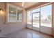 Enclosed patio with view of the backyard at 22993 W Micah Way, Buckeye, AZ 85326