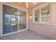 Covered patio with tiled floor and ceiling fan at 22993 W Micah Way, Buckeye, AZ 85326