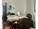 A wooden table with chairs is the perfect space for enjoying meals at 2311 E Hartford Ave # 38, Phoenix, AZ 85022