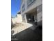 Back exterior of the home with a patio and drought tolerant landscape at 2311 E Hartford Ave # 38, Phoenix, AZ 85022