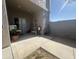 Private patio with pavers, potted plants, and cozy seating area for relaxation and entertainment at 2311 E Hartford Ave # 38, Phoenix, AZ 85022
